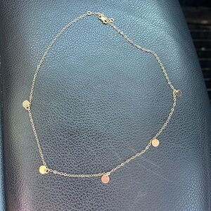 Gold plated disc necklace never worn.